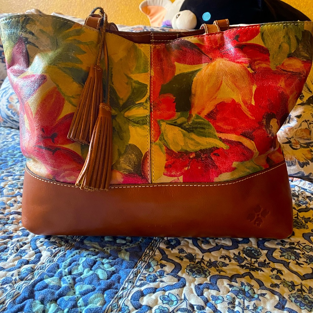Patricia Nash leather tote with floral print.